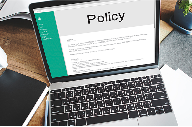checking policy on laptop